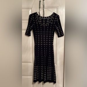 Black and almond striped sweater dress